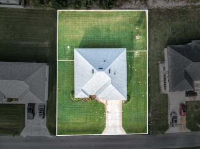 Welcome to this modern 3-bed, 2-bath CBS home in desirable Sun on Sun n Lake Golf and Country Club in Florida - for sale on GolfHomes.com, golf home, golf lot