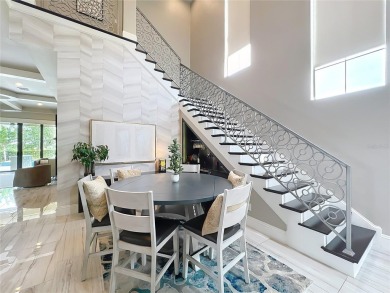 This is an exceptional opportunity to own a modern masterpiece on Bella Collina Golf Club in Florida - for sale on GolfHomes.com, golf home, golf lot
