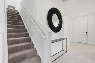 Discover elegant Florida living in this spacious 3-bedroom + den on River Hall Country Club in Florida - for sale on GolfHomes.com, golf home, golf lot
