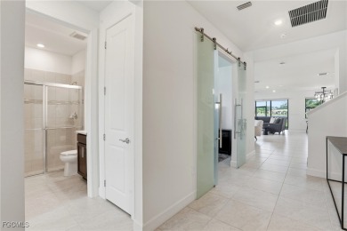 Discover elegant Florida living in this spacious 3-bedroom + den on River Hall Country Club in Florida - for sale on GolfHomes.com, golf home, golf lot