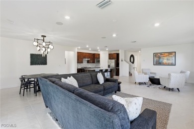 Discover elegant Florida living in this spacious 3-bedroom + den on River Hall Country Club in Florida - for sale on GolfHomes.com, golf home, golf lot