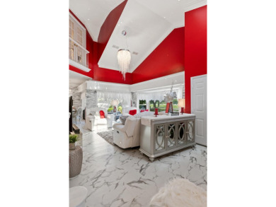 Experience vacation-style living every day in this beautifully on Griffin Gate Golf Resort in Kentucky - for sale on GolfHomes.com, golf home, golf lot