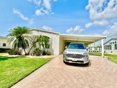 Live the lifestyle of luxury and convenience in this stunning on Crane Lakes Golf and Country Club in Florida - for sale on GolfHomes.com, golf home, golf lot