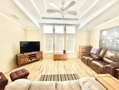 Live the lifestyle of luxury and convenience in this stunning on Crane Lakes Golf and Country Club in Florida - for sale on GolfHomes.com, golf home, golf lot