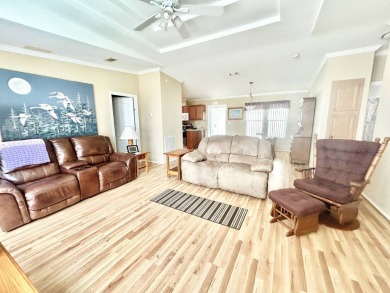 Live the lifestyle of luxury and convenience in this stunning on Crane Lakes Golf and Country Club in Florida - for sale on GolfHomes.com, golf home, golf lot