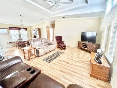 Live the lifestyle of luxury and convenience in this stunning on Crane Lakes Golf and Country Club in Florida - for sale on GolfHomes.com, golf home, golf lot