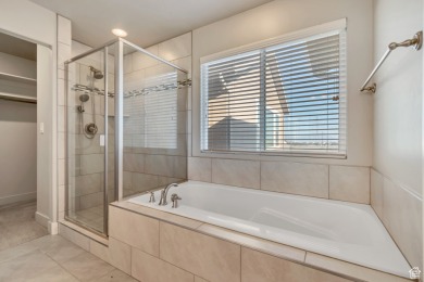 Enjoy laminate floors, an open kitchen with quartz counters on The Ranches Golf Club in Utah - for sale on GolfHomes.com, golf home, golf lot