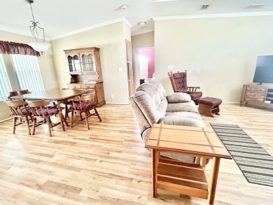 Live the lifestyle of luxury and convenience in this stunning on Crane Lakes Golf and Country Club in Florida - for sale on GolfHomes.com, golf home, golf lot