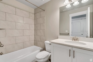 Enjoy laminate floors, an open kitchen with quartz counters on The Ranches Golf Club in Utah - for sale on GolfHomes.com, golf home, golf lot