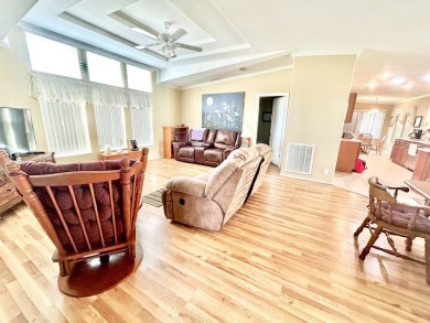 Live the lifestyle of luxury and convenience in this stunning on Crane Lakes Golf and Country Club in Florida - for sale on GolfHomes.com, golf home, golf lot