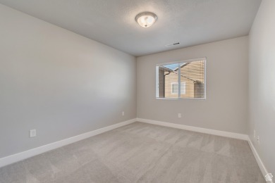 Enjoy laminate floors, an open kitchen with quartz counters on The Ranches Golf Club in Utah - for sale on GolfHomes.com, golf home, golf lot