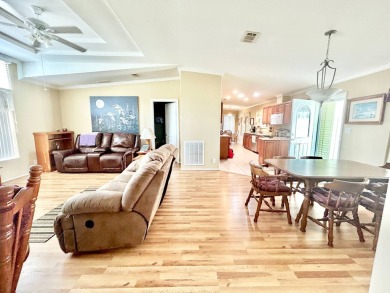Live the lifestyle of luxury and convenience in this stunning on Crane Lakes Golf and Country Club in Florida - for sale on GolfHomes.com, golf home, golf lot