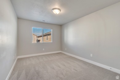 Enjoy laminate floors, an open kitchen with quartz counters on The Ranches Golf Club in Utah - for sale on GolfHomes.com, golf home, golf lot