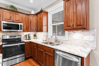 Experience the best of Tellico Village living at 104 Gado Way--a on Tellico Village Golf Club in Tennessee - for sale on GolfHomes.com, golf home, golf lot