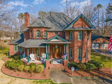 Welcome to this lovely 2-story, brick, traditional home nestled on Zebulon Country Club in North Carolina - for sale on GolfHomes.com, golf home, golf lot