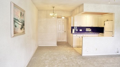 Beautiful 1 bed, 1 bath condo with an open floor plan located on on Hillsboro Pines Golf in Florida - for sale on GolfHomes.com, golf home, golf lot
