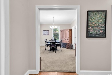 This beautiful condo has it all!  Two primary suites both with on Pawleys Plantation Golf and Country Club in South Carolina - for sale on GolfHomes.com, golf home, golf lot