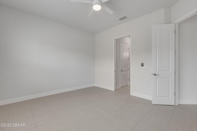 Located in the gated community of Plantation Bay, this well on Plantation Bay Golf and Country Club in Florida - for sale on GolfHomes.com, golf home, golf lot