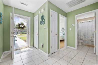 Located in the gated Myrtle Beach Golf & Yacht Club community on Heron Point Golf Club in South Carolina - for sale on GolfHomes.com, golf home, golf lot