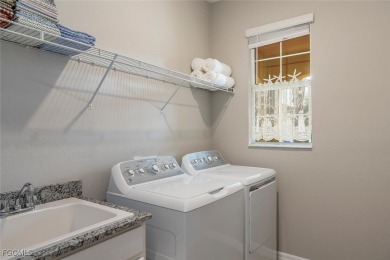 Waterfront Perfection in a Premier 55+ Golfing Community!! on Pelican Preserve Golf Club in Florida - for sale on GolfHomes.com, golf home, golf lot