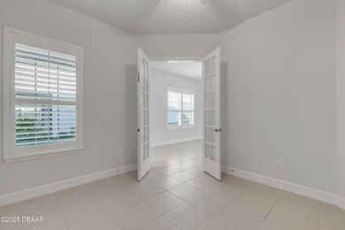 Located in the gated community of Plantation Bay, this well on Plantation Bay Golf and Country Club in Florida - for sale on GolfHomes.com, golf home, golf lot