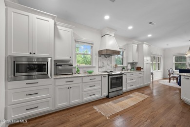 Nestled in the prestigious gated community of River Landing on River Landing Golf Course in North Carolina - for sale on GolfHomes.com, golf home, golf lot