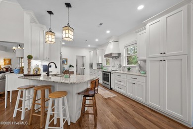 Nestled in the prestigious gated community of River Landing on River Landing Golf Course in North Carolina - for sale on GolfHomes.com, golf home, golf lot