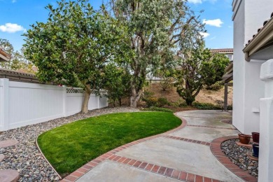 The open-concept family and dining area creates a welcoming on Ocean Hills Country Club in California - for sale on GolfHomes.com, golf home, golf lot