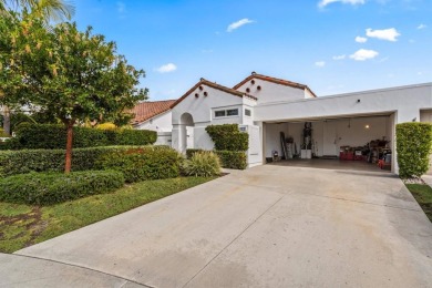 The open-concept family and dining area creates a welcoming on Ocean Hills Country Club in California - for sale on GolfHomes.com, golf home, golf lot