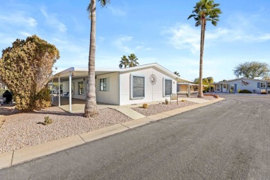 Spacious and fully furnished, this 3-bedroom, 2-bathroom split on Painted Mountain Golf Club in Arizona - for sale on GolfHomes.com, golf home, golf lot