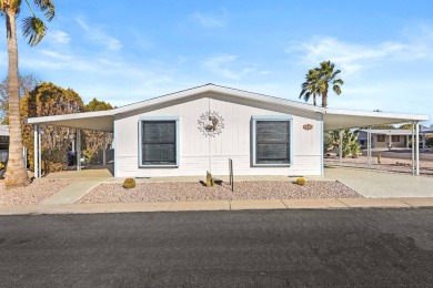 Spacious and fully furnished, this 3-bedroom, 2-bathroom split on Painted Mountain Golf Club in Arizona - for sale on GolfHomes.com, golf home, golf lot