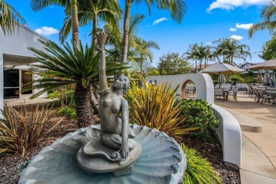 The open-concept family and dining area creates a welcoming on Ocean Hills Country Club in California - for sale on GolfHomes.com, golf home, golf lot