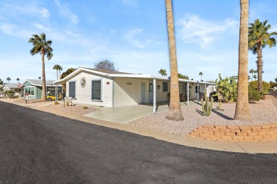 Spacious and fully furnished, this 3-bedroom, 2-bathroom split on Painted Mountain Golf Club in Arizona - for sale on GolfHomes.com, golf home, golf lot