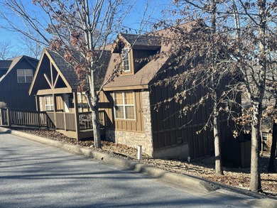 Looking for the perfect vacation retreat for your family to on Ledgestone Country Club and Golf Course in Missouri - for sale on GolfHomes.com, golf home, golf lot