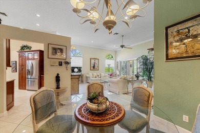 Discover your dream retreat nestled in the prestigious Cambridge on Wycliffe Golf and Country Club in Florida - for sale on GolfHomes.com, golf home, golf lot
