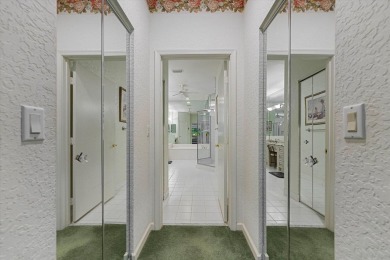 Discover your dream retreat nestled in the prestigious Cambridge on Wycliffe Golf and Country Club in Florida - for sale on GolfHomes.com, golf home, golf lot