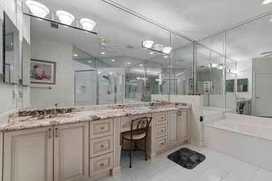 Discover your dream retreat nestled in the prestigious Cambridge on Wycliffe Golf and Country Club in Florida - for sale on GolfHomes.com, golf home, golf lot