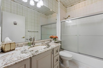 Discover your dream retreat nestled in the prestigious Cambridge on Wycliffe Golf and Country Club in Florida - for sale on GolfHomes.com, golf home, golf lot