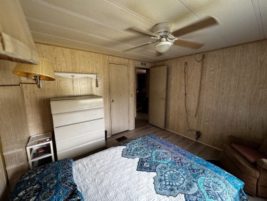 Charming 1982 Palm double-wide manufactured home located in the on Rolling Greens Executive Golf Community in Florida - for sale on GolfHomes.com, golf home, golf lot