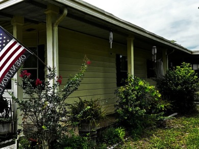 Charming 1982 Palm double-wide manufactured home located in the on Rolling Greens Executive Golf Community in Florida - for sale on GolfHomes.com, golf home, golf lot