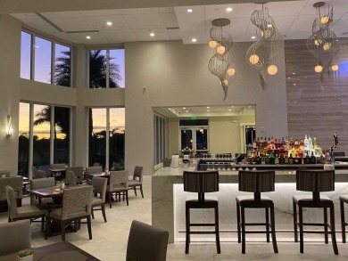 Discover your dream retreat nestled in the prestigious Cambridge on Wycliffe Golf and Country Club in Florida - for sale on GolfHomes.com, golf home, golf lot
