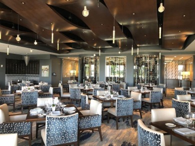Discover your dream retreat nestled in the prestigious Cambridge on Wycliffe Golf and Country Club in Florida - for sale on GolfHomes.com, golf home, golf lot