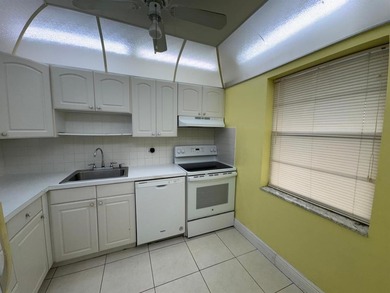 2/2 CONDOMINIUM FOR SALE IN DESIRABLE VERY ACTIVE COMMUNITY AT on Oriole Golf and Tennis Club in Florida - for sale on GolfHomes.com, golf home, golf lot