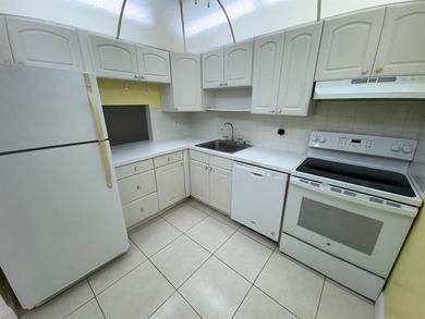 2/2 CONDOMINIUM FOR SALE IN DESIRABLE VERY ACTIVE COMMUNITY AT on Oriole Golf and Tennis Club in Florida - for sale on GolfHomes.com, golf home, golf lot