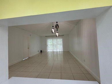 2/2 CONDOMINIUM FOR SALE IN DESIRABLE VERY ACTIVE COMMUNITY AT on Oriole Golf and Tennis Club in Florida - for sale on GolfHomes.com, golf home, golf lot