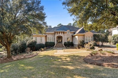 Tucked along the Rock Creek Golf Course in Fairhope, this on Rock Creek Golf Club in Alabama - for sale on GolfHomes.com, golf home, golf lot
