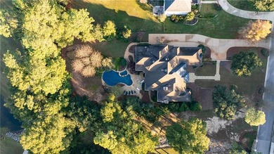 Tucked along the Rock Creek Golf Course in Fairhope, this on Rock Creek Golf Club in Alabama - for sale on GolfHomes.com, golf home, golf lot