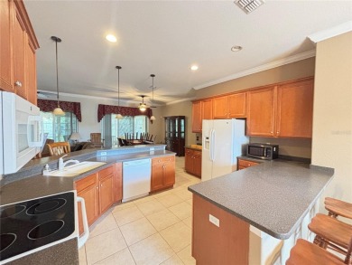 Welcome to this well maintained 3-bedroom, 2-bathroom home. The on Tampa Bay Golf and Country Club in Florida - for sale on GolfHomes.com, golf home, golf lot