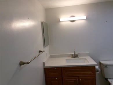 This is a stunning 1 bedroom 1.5 bath unit located on the first on Wynmoor Golf Course in Florida - for sale on GolfHomes.com, golf home, golf lot