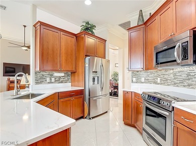 Some homes check boxes. This one raises the bar. Nestled in The on Herons Glen Golf and Country Club in Florida - for sale on GolfHomes.com, golf home, golf lot